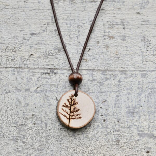 wood burned tree necklace with dark wood bead