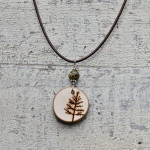 wood burned tree necklace with green stone bead