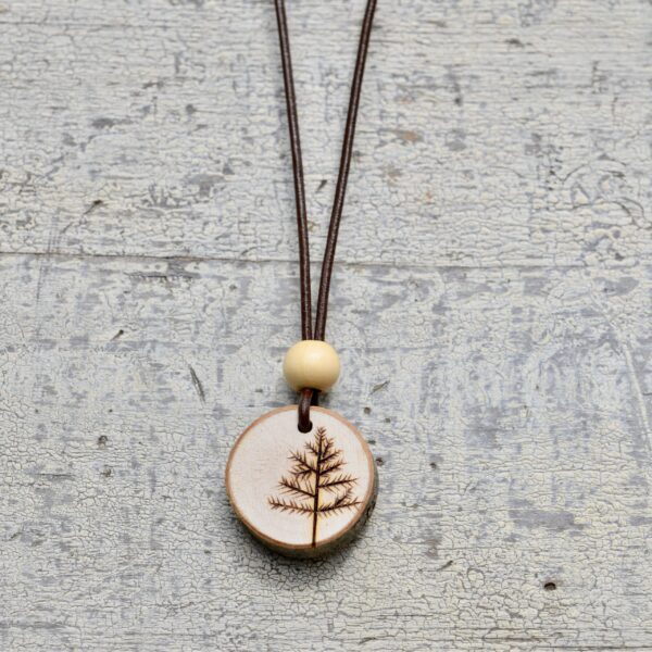 wood burned tree necklace with light wood bead