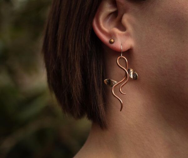 Bronze Stud Earring and Twisted Vine Earring on model (1)