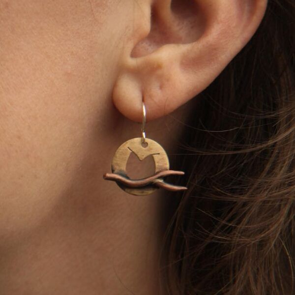 Full Moon Owl Earrings with copper branch on model