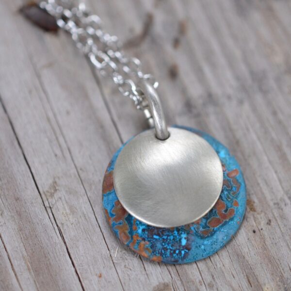 blue patina dome necklace with brushed nickel overlay necklace close up square