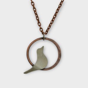 copper and nickel bird silhouette pendant on copper chain front